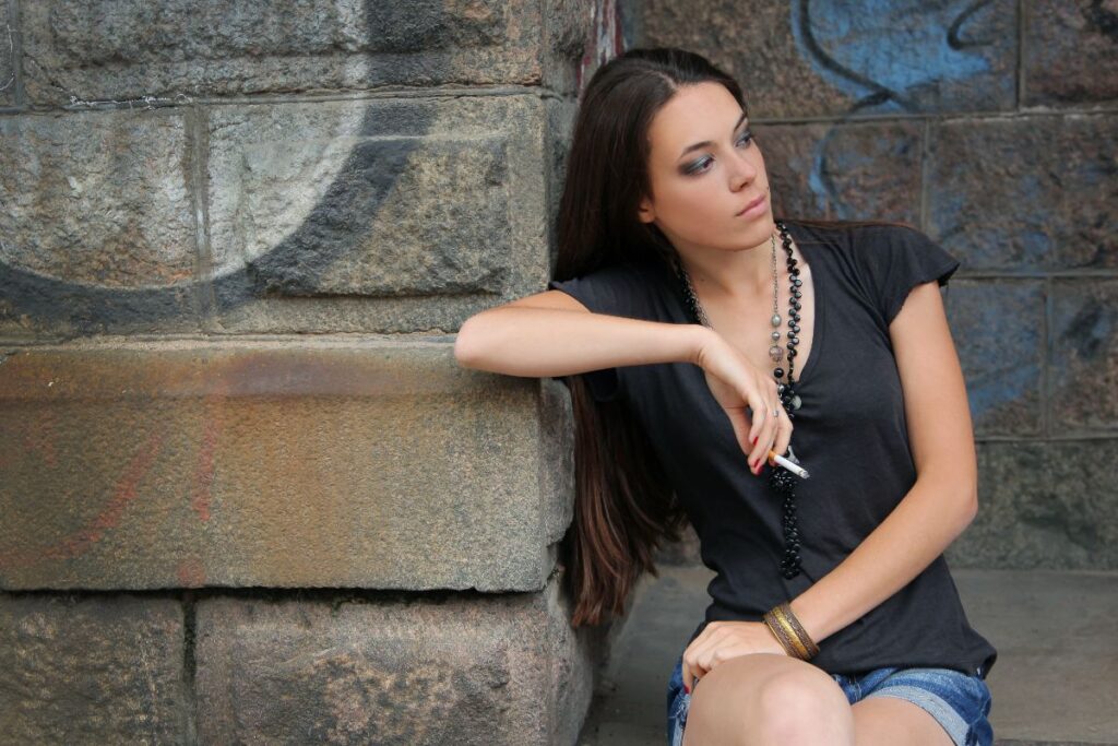 teen smoking a cigarette