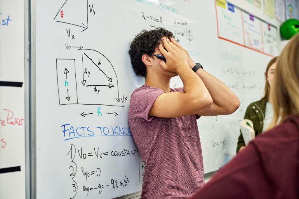 teen with anxiety struggles during class