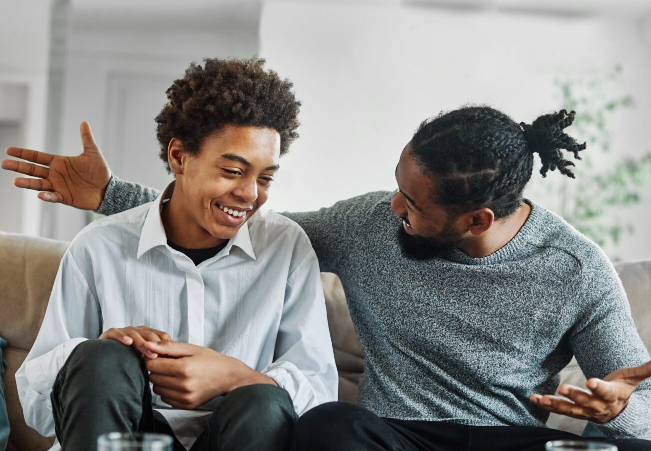 Portrait,Of,A,Happy,Teenage,Boy,Son,Talking,To,His