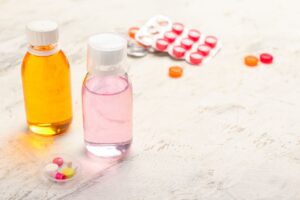 cough and cold OTC medicine bottles and capsules