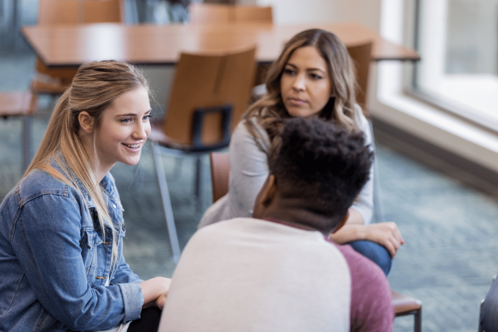 patients sitting in group discussing Is ADHD neurodivergent