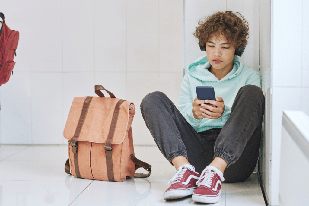 kid sitting on the floor at school wondering ADHD neurodivergent