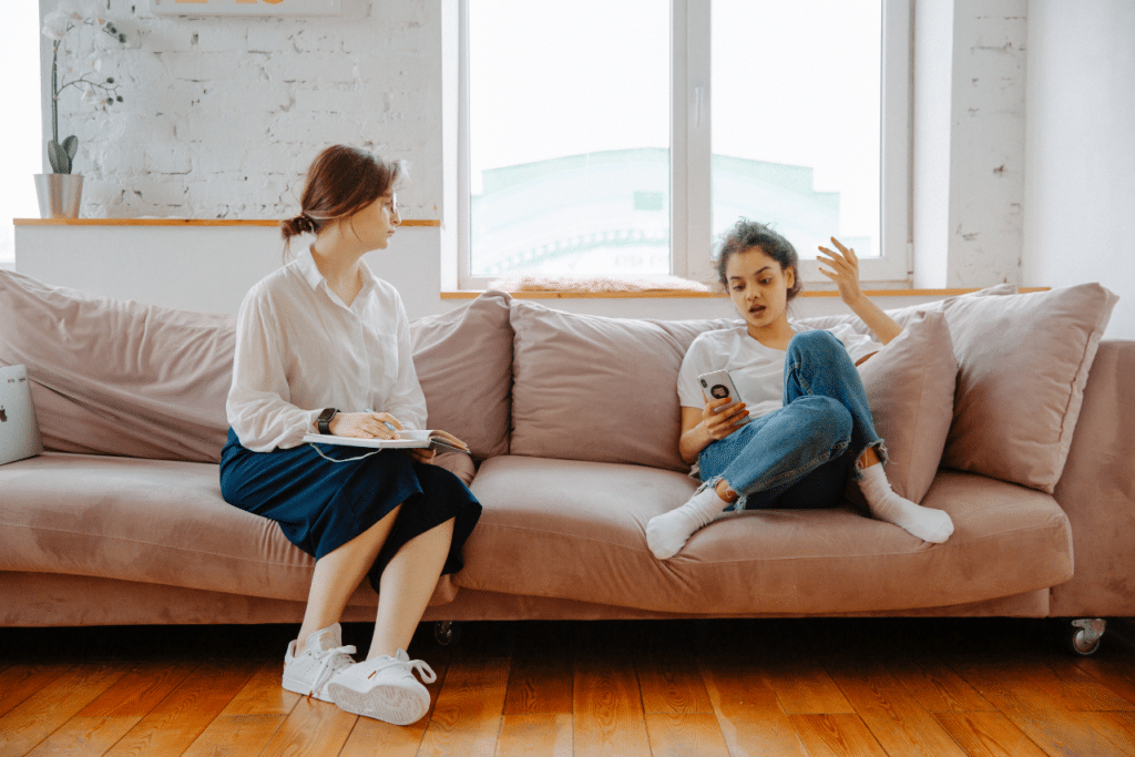 teen patient speaking with her therapist about her fear of school