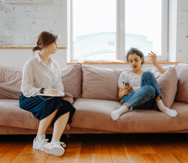 teen patient speaking with her therapist about her fear of school