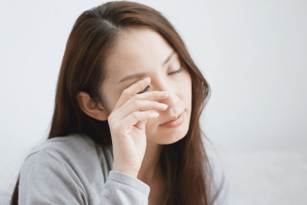 Teen Rubbing Face