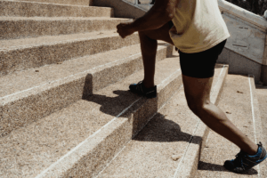 man running up stairs
