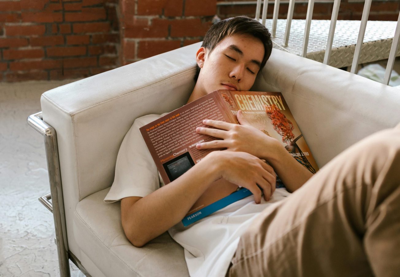 Teen sleeping on couch