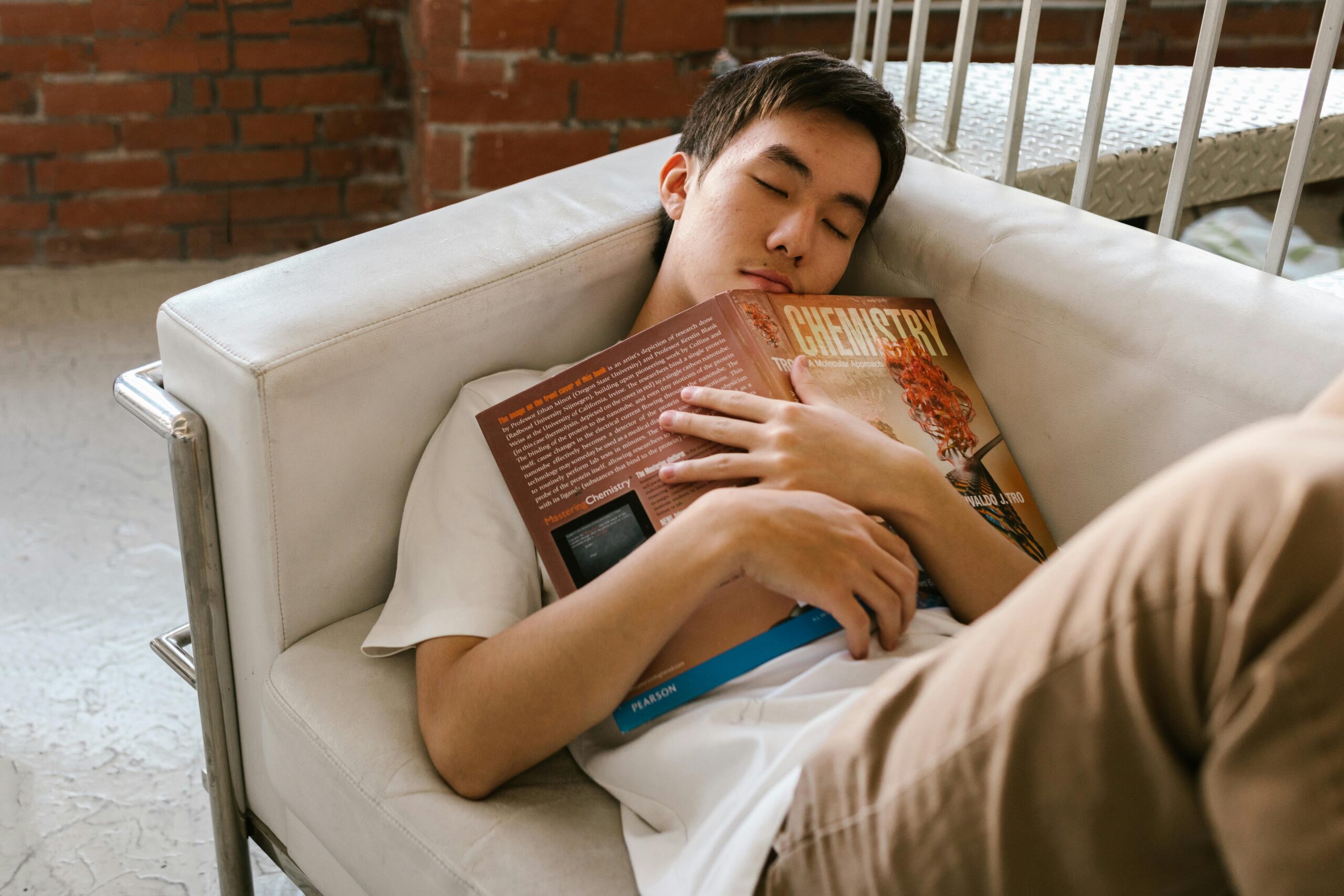 Teen sleeping on couch